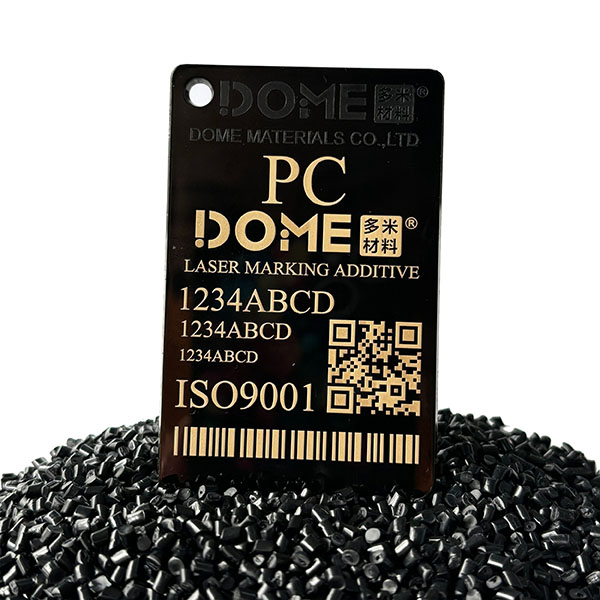 Laser-marked Golden on Black Molded PC Part - Laser Marking Additive Masterbatch