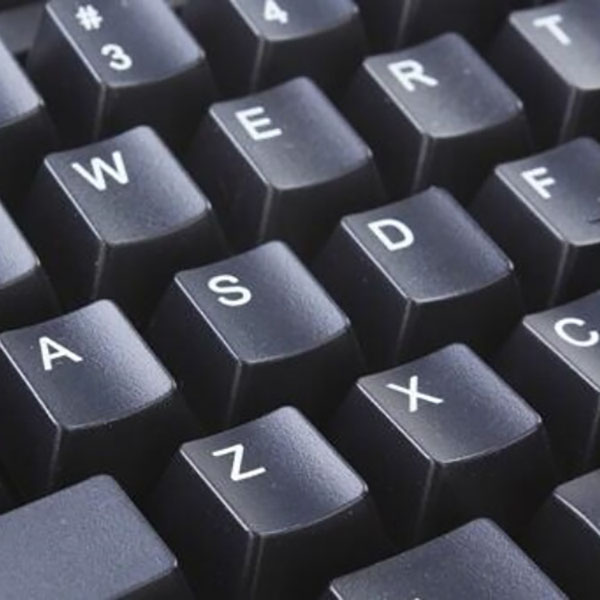 Laser marking pigment powder application for ABS keyboards